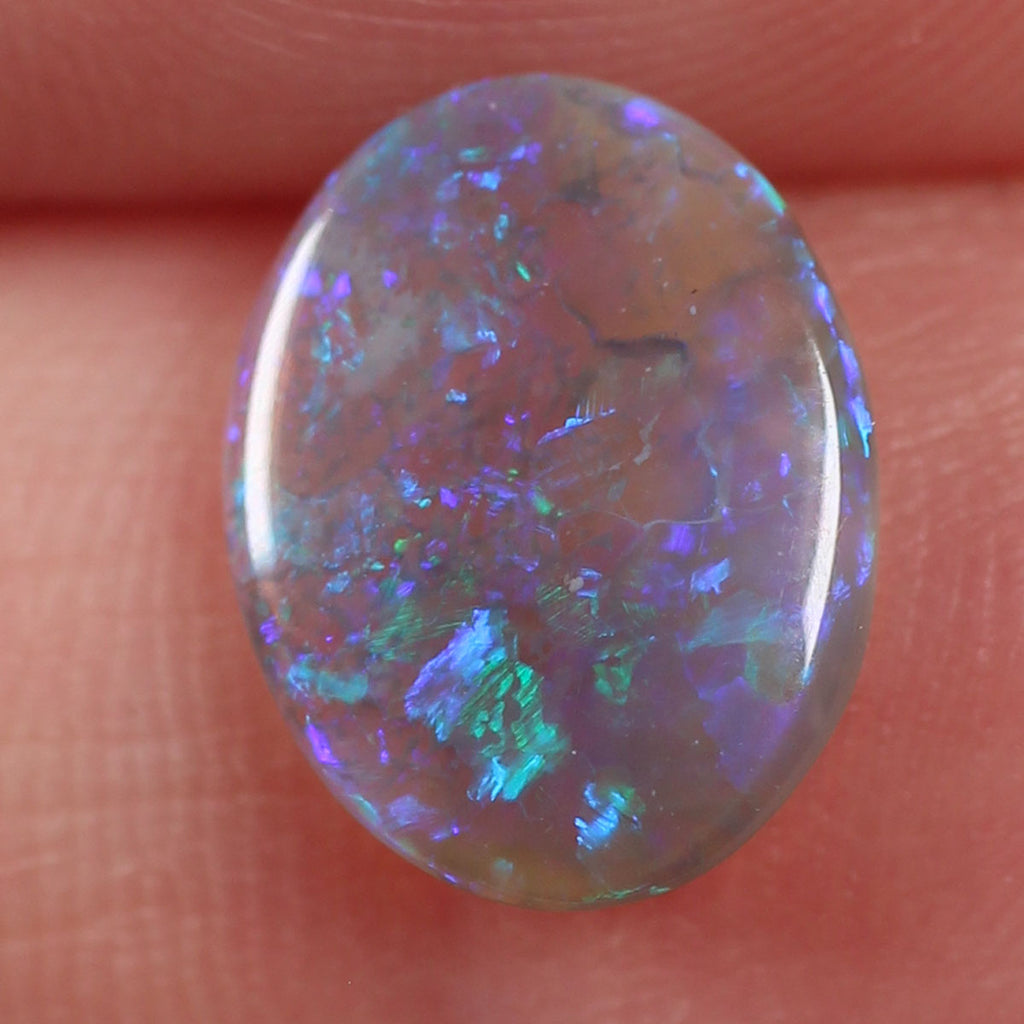 1.12ct dark crystal opal from Lightning Ridge with purple-blue foil flash play-of-colour