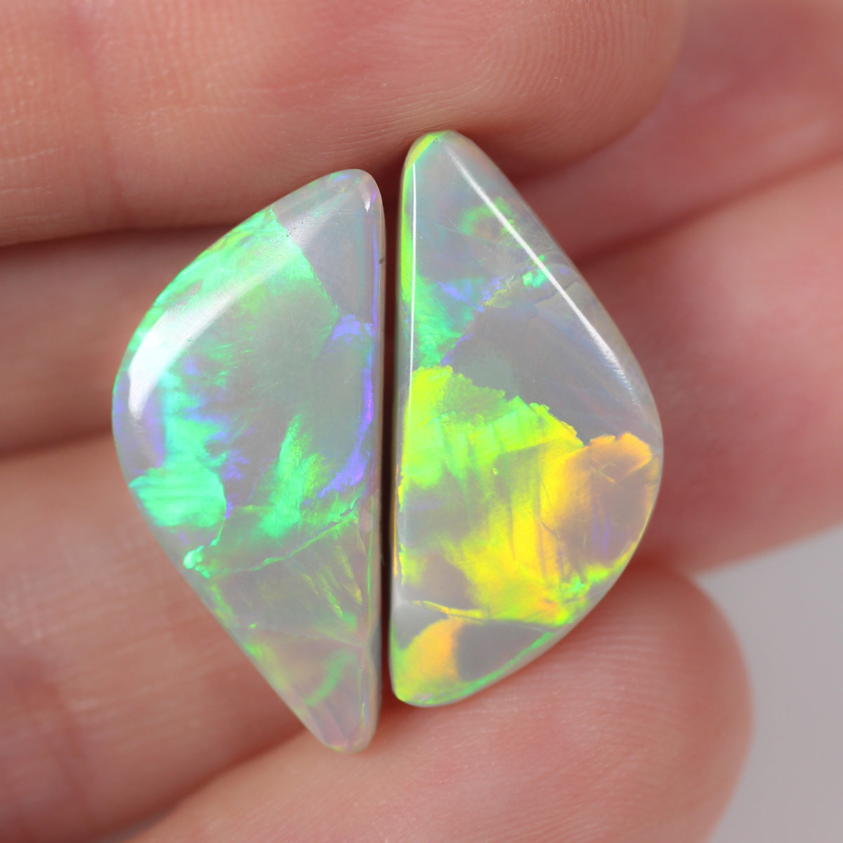 12.84ct Dark Opal - 10 x 22.5 x 4 (x2)