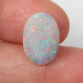 Lightning Ridge dark opal 3ct showing soft orange-green play-of-colour