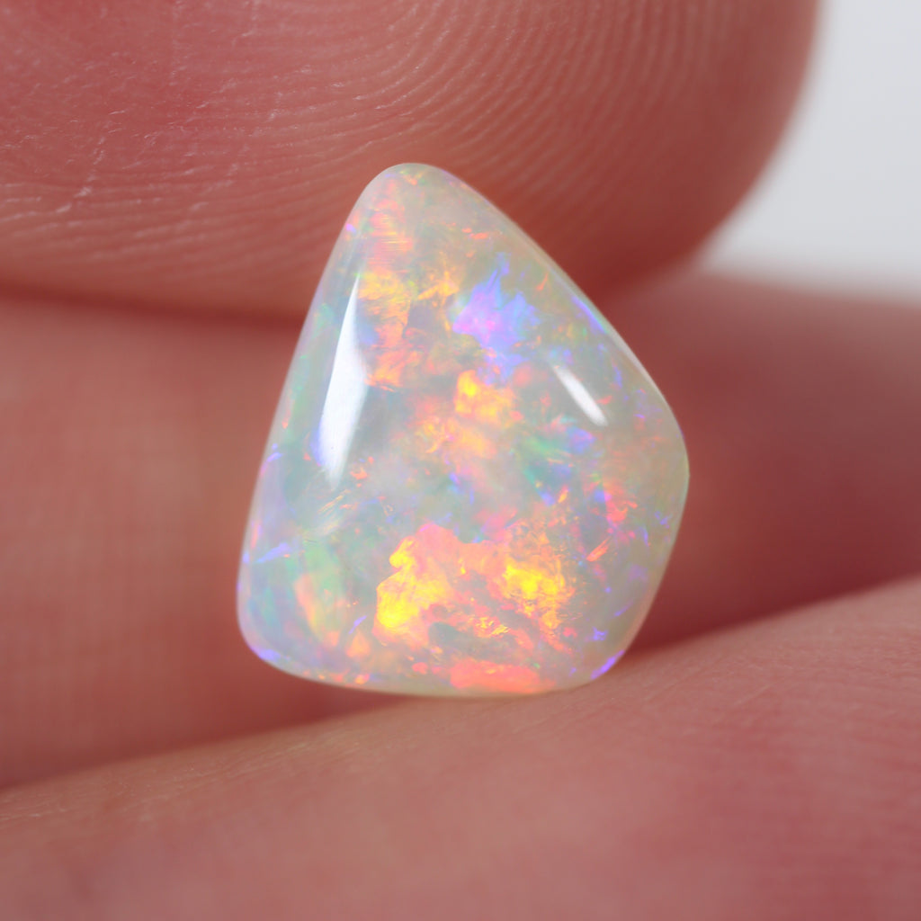Red-orange light opal 1.9ct natural solid Australian opal from Coober Pedy