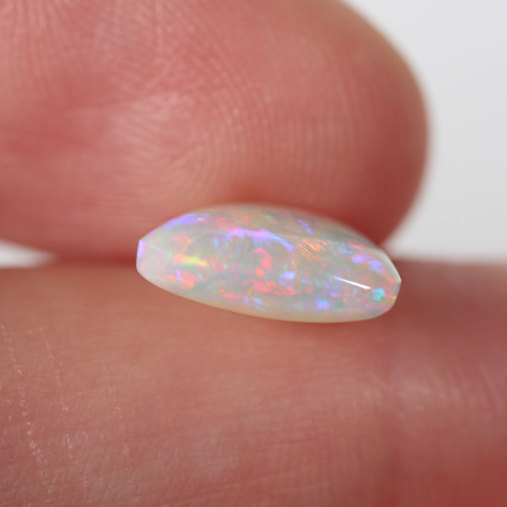 Close detail of floral pattern on light opal