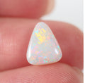 Natural light opal from Lightning Ridge, 1.54ct with soft orange-yellow flash