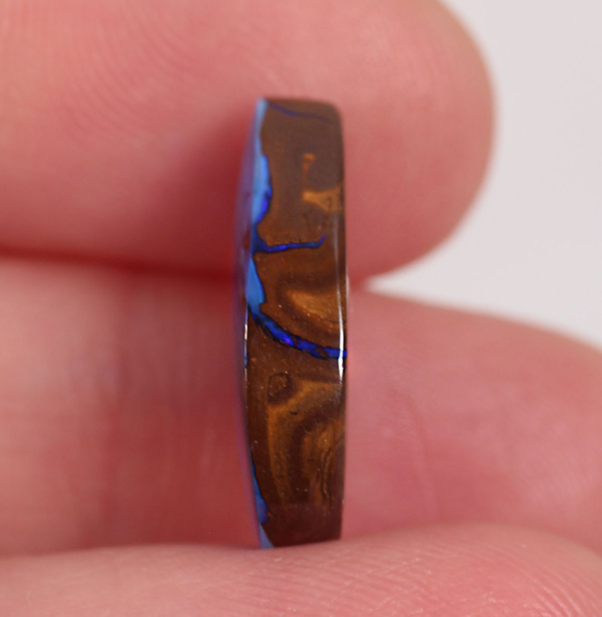 7.6ct Boulder Opal - 10.2 x 17.7 x 4.4mm