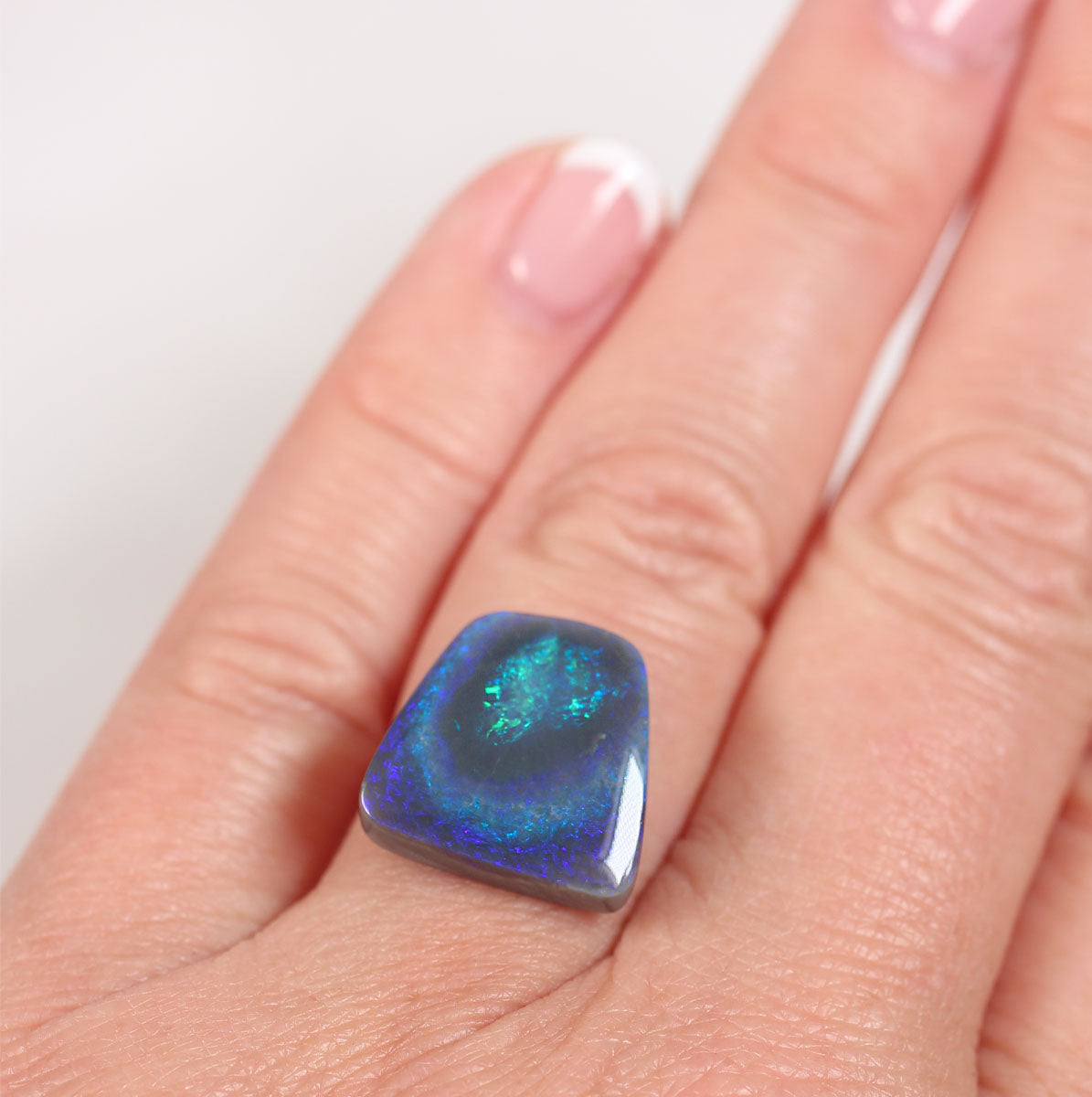 8.1ct Black Opal - 14.5 x 14.7 x 5mm