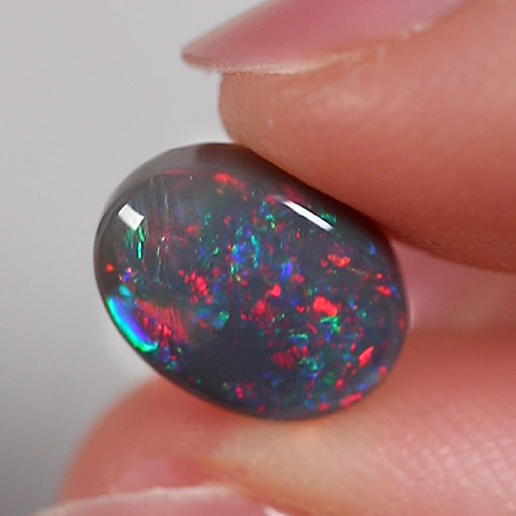 2.75ct Solid Black Opal - 8.4 x 11 x 4mm