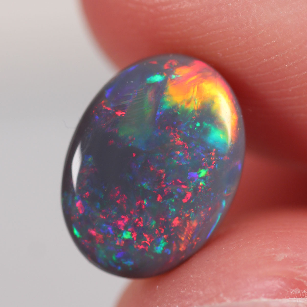 2.75ct Solid Black Opal - 8.4 x 11 x 4mm