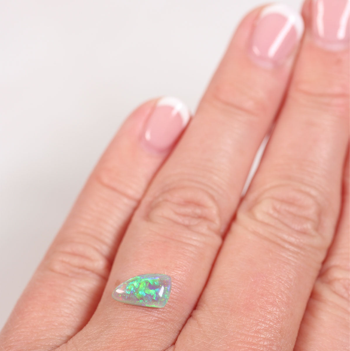 1.05 ct Dark Crystal Opal - 6.3 x 10 x 3mm