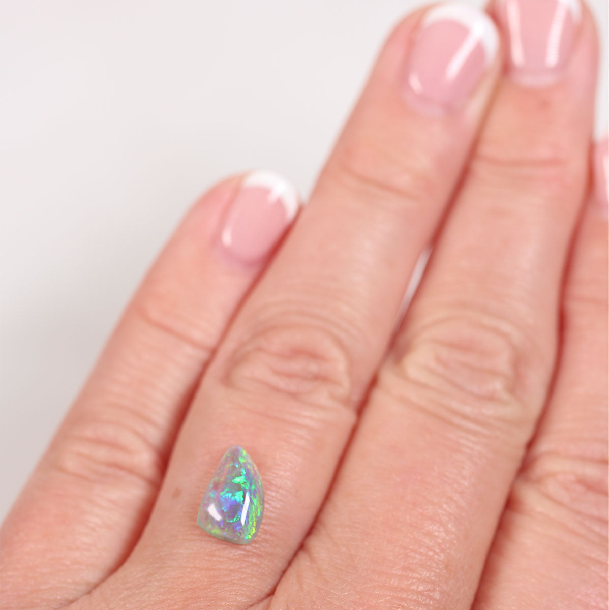 1.05 ct Dark Crystal Opal - 6.3 x 10 x 3mm