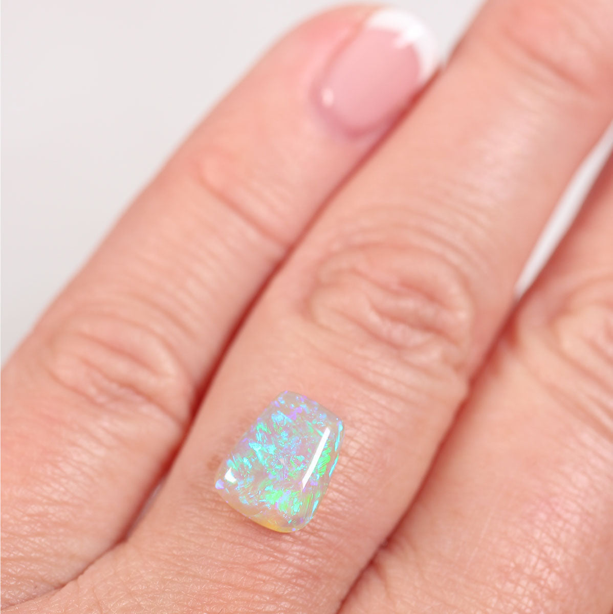 1.8ct Dark Crystal Opal - 7.8 x 9.7 x 3.6mm