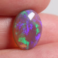 3.2ct refined purple-green dark crystal opal cabochon with foil flash pattern
