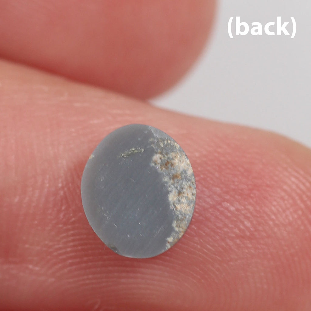 0.74ct Black Opal - 6.5 x 7.5 x 2.5mm