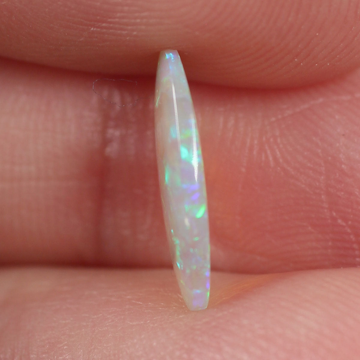 0.85ct Dark Crystal Opal - 6.5 x 11.7 x 2mm