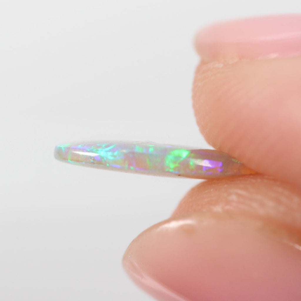 0.85ct Dark Crystal Opal - 6.5 x 11.7 x 2mm