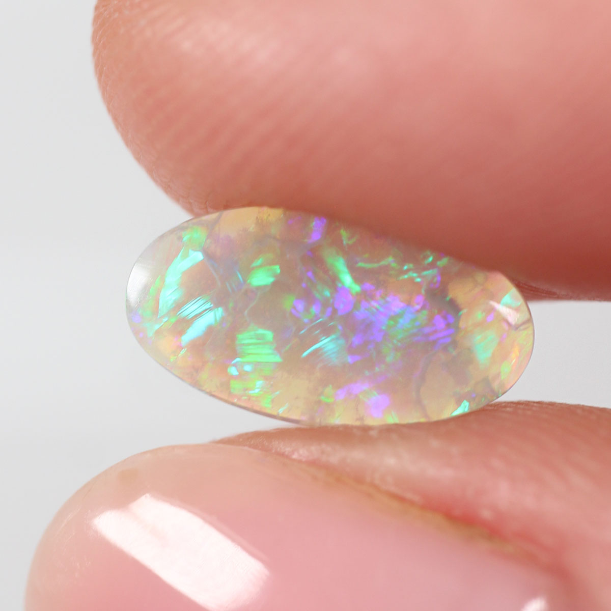 0.85ct Dark Crystal Opal - 6.5 x 11.7 x 2mm
