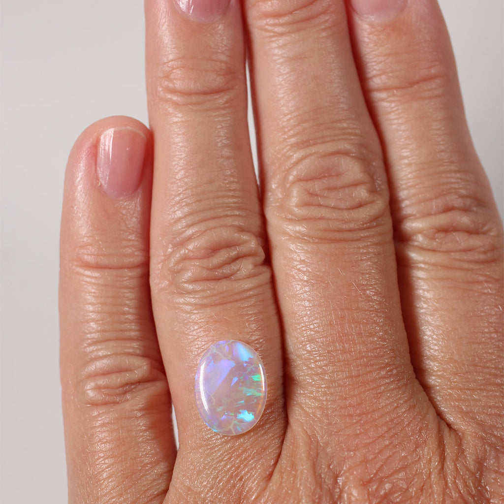 Side profile of 1.86ct light crystal opal showing natural solid body
