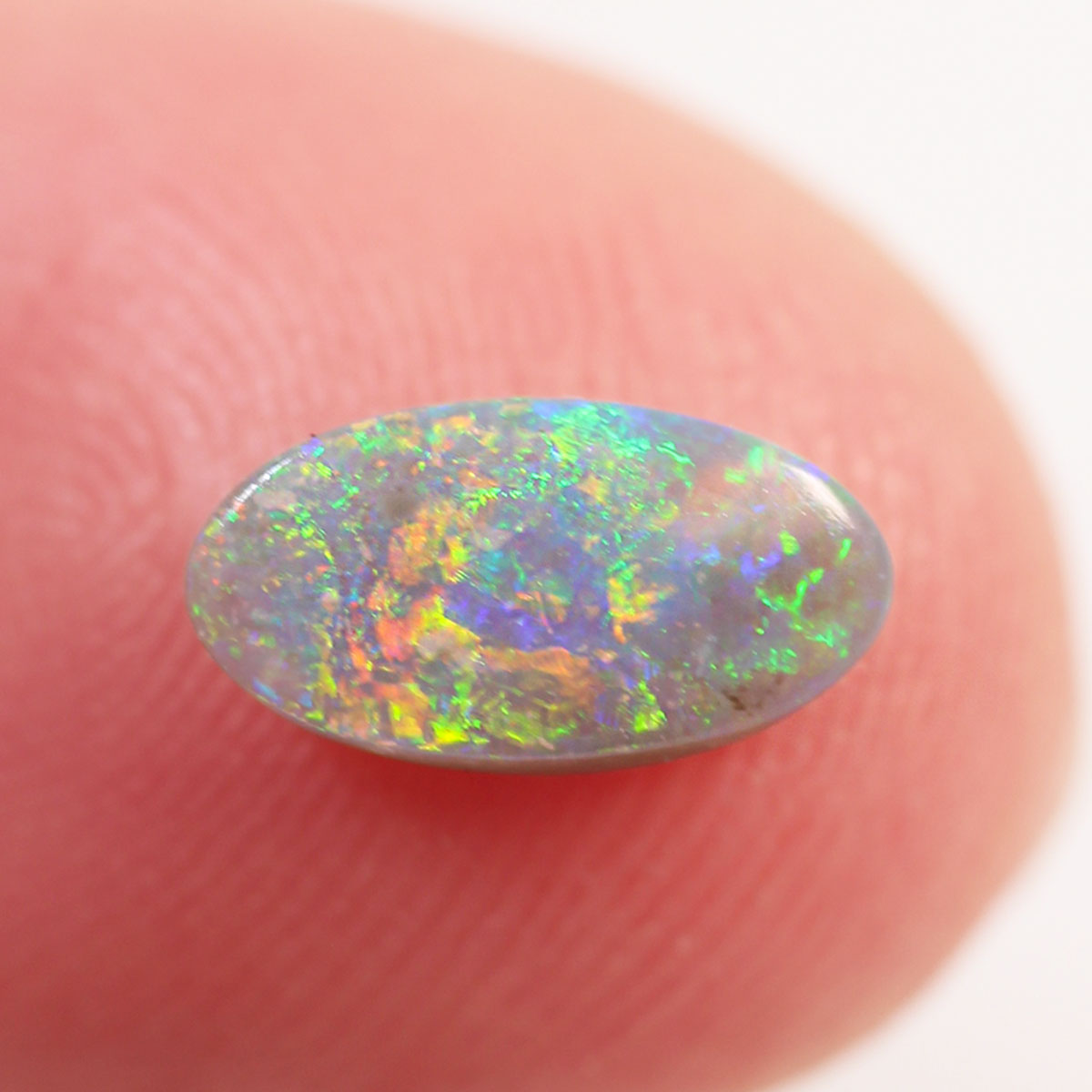 0.5 ct Dark Crystal Opal - 4.3 x 8.5 x 2mm