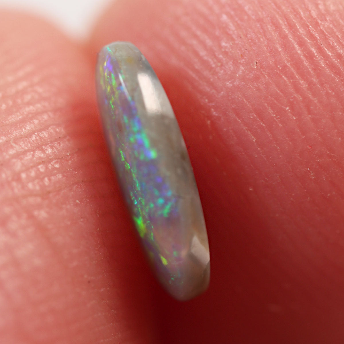0.5 ct Dark Crystal Opal - 4.3 x 8.5 x 2mm