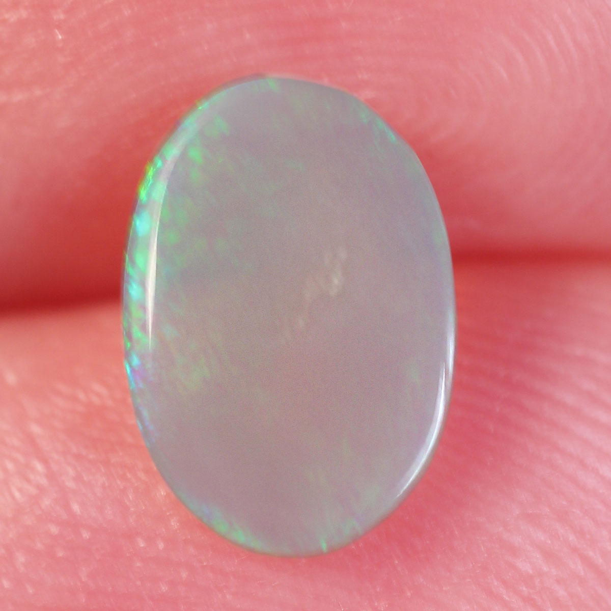 0.7ct Dark Crystal Opal - 6.2 x 9 x 1.9mm