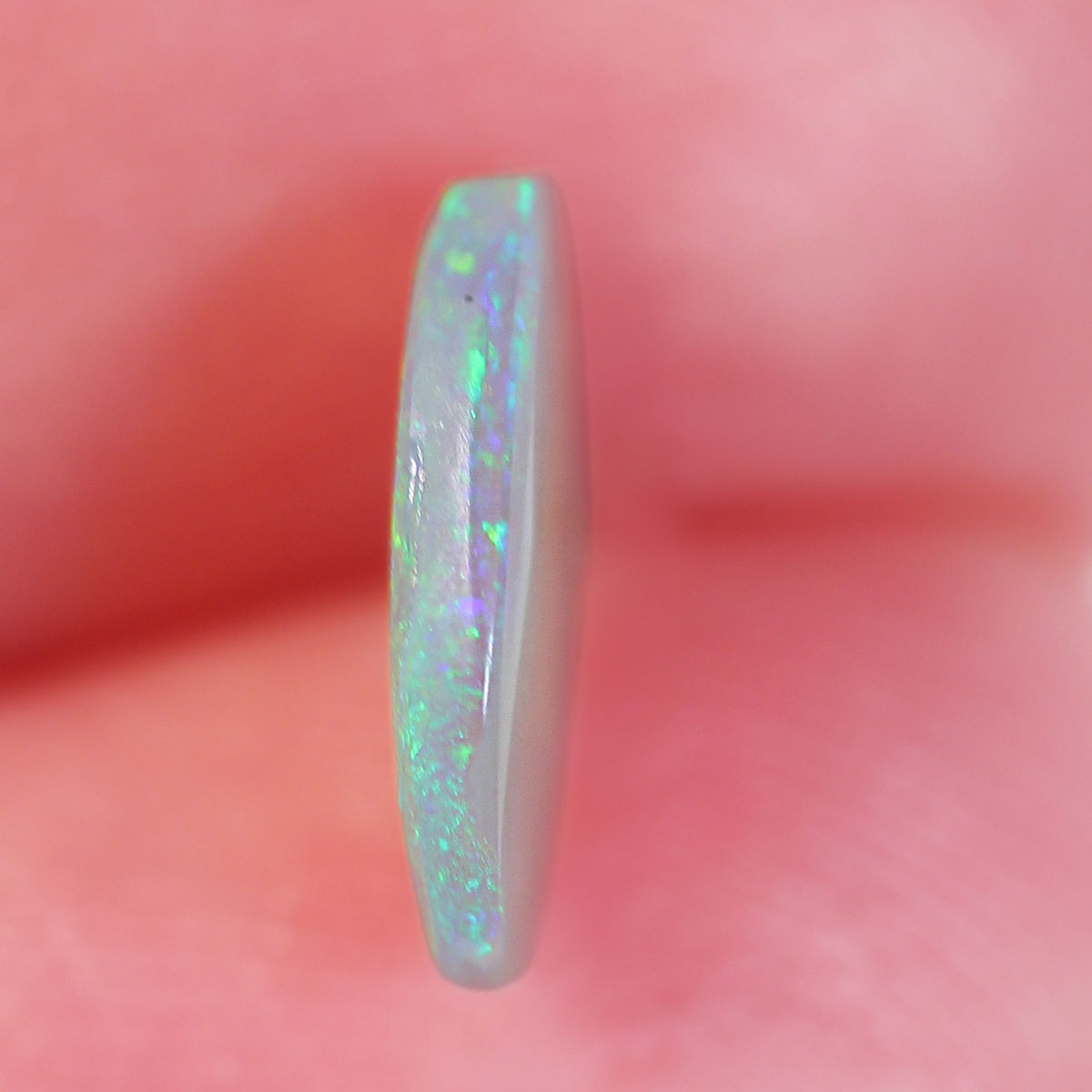 0.7ct Dark Crystal Opal - 6.2 x 9 x 1.9mm