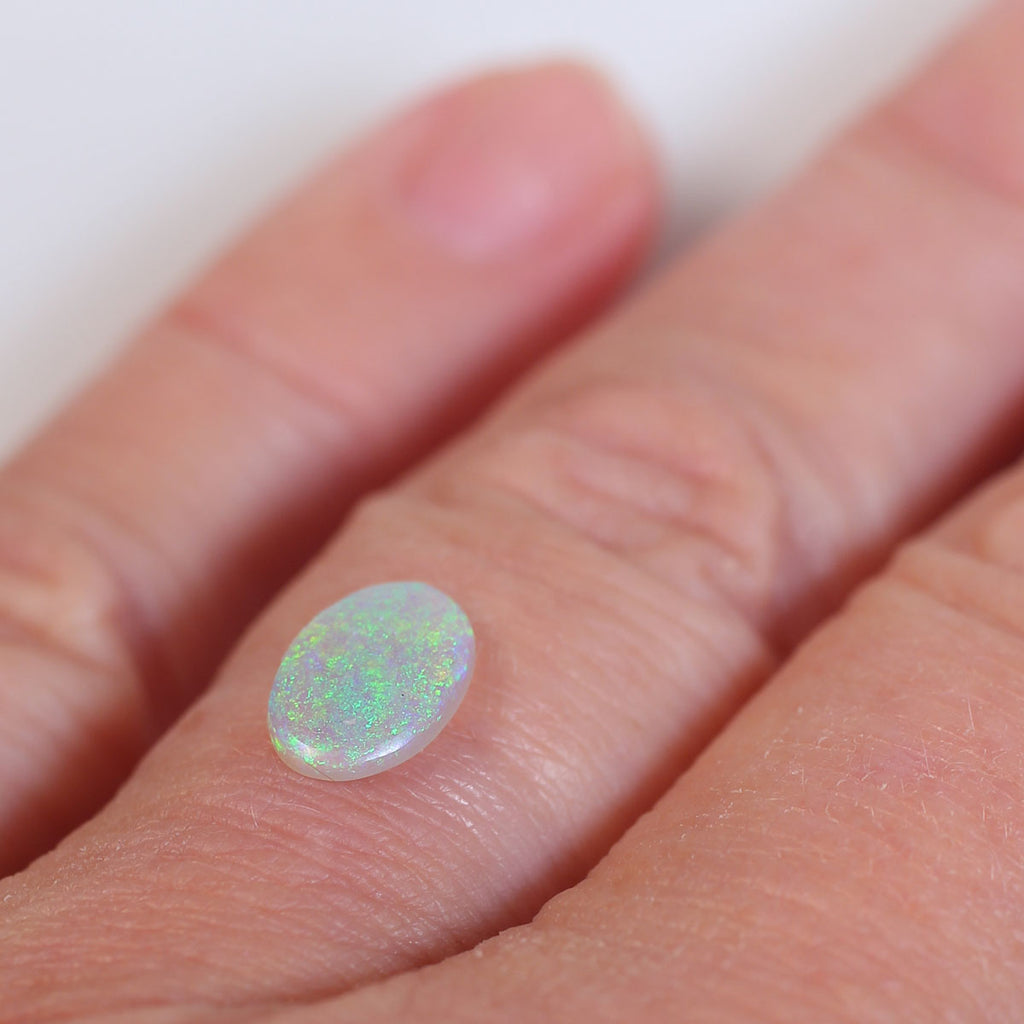 0.7ct Dark Crystal Opal - 6.2 x 9 x 1.9mm