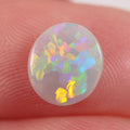 0.7ct Australian dark opal cabochon with multicolour jigsaw