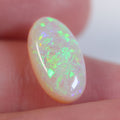 3.7ct Australian light opal cabochon with green foil flash