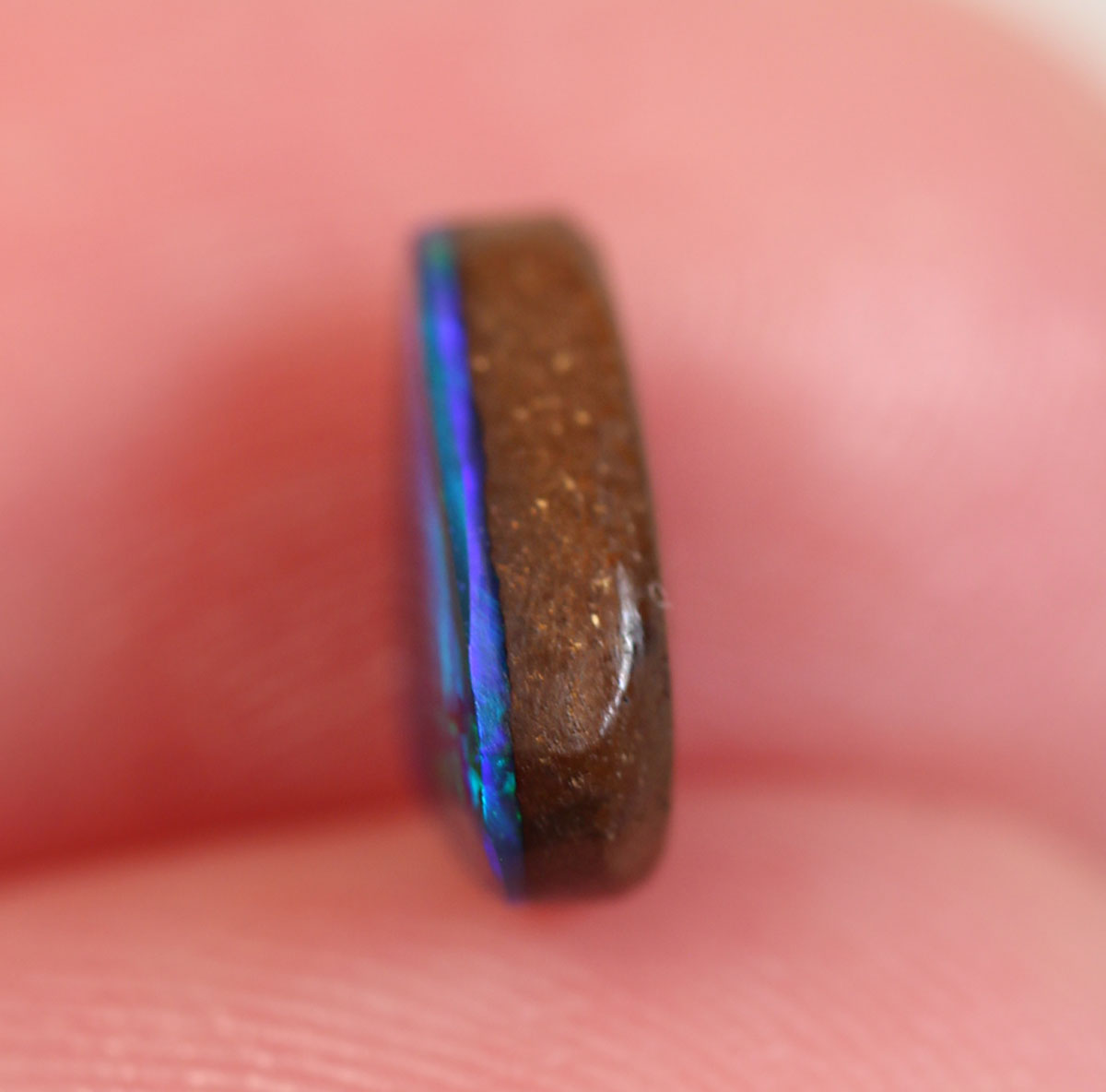 1.1ct Boulder Opal - 5.6 x 8.3 x 3mm
