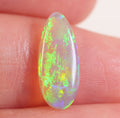1.4ct Australian crystal opal cabochon with green-yellow foil flash