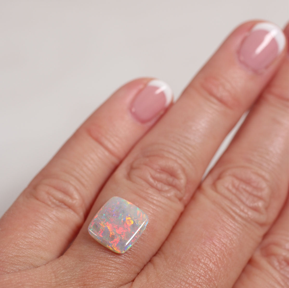 2.33ct Dark Opal - 10.4 x 11 x 2.7 mm