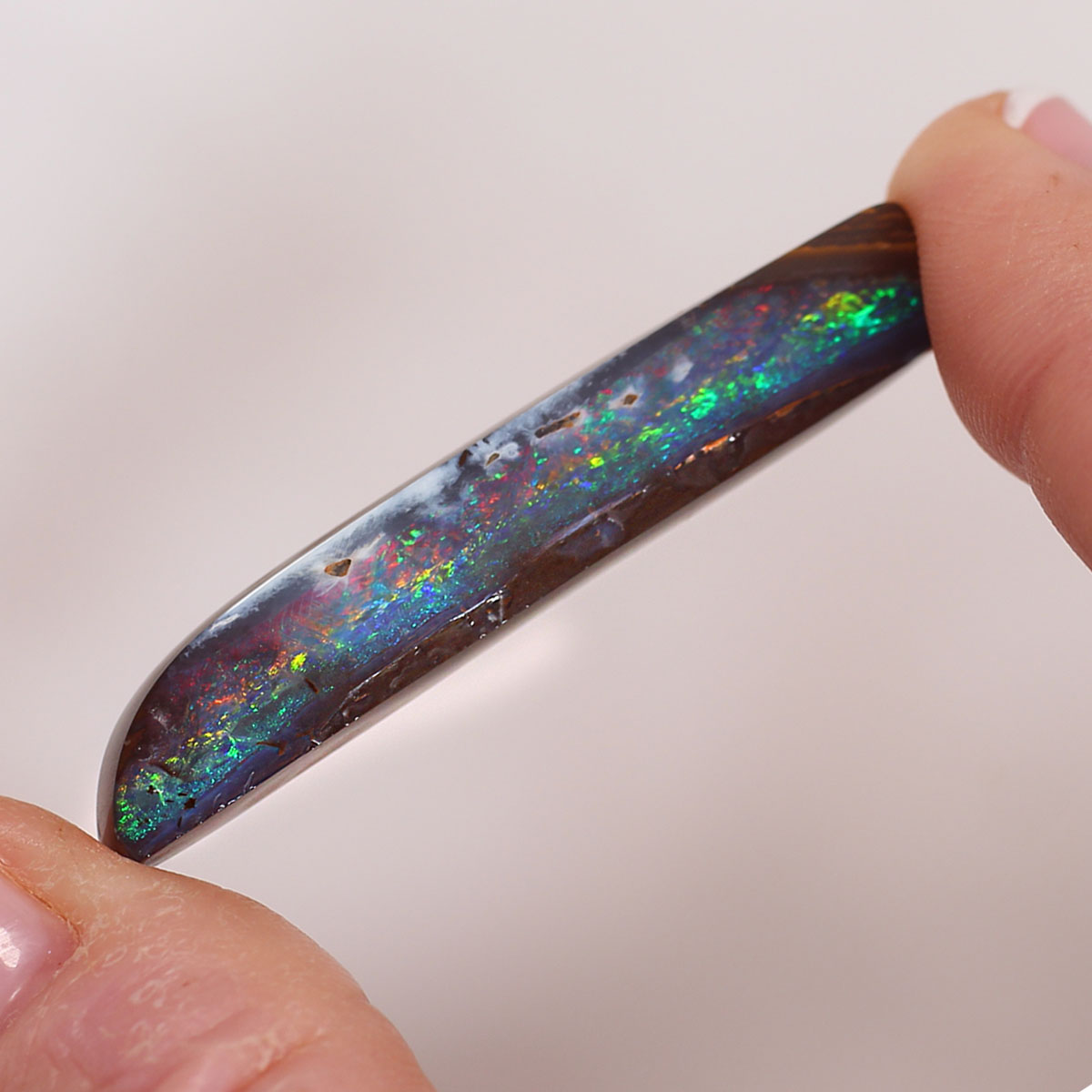 30.3 ct Boulder Opal - 9.5 x 42.4 x 6.3mm