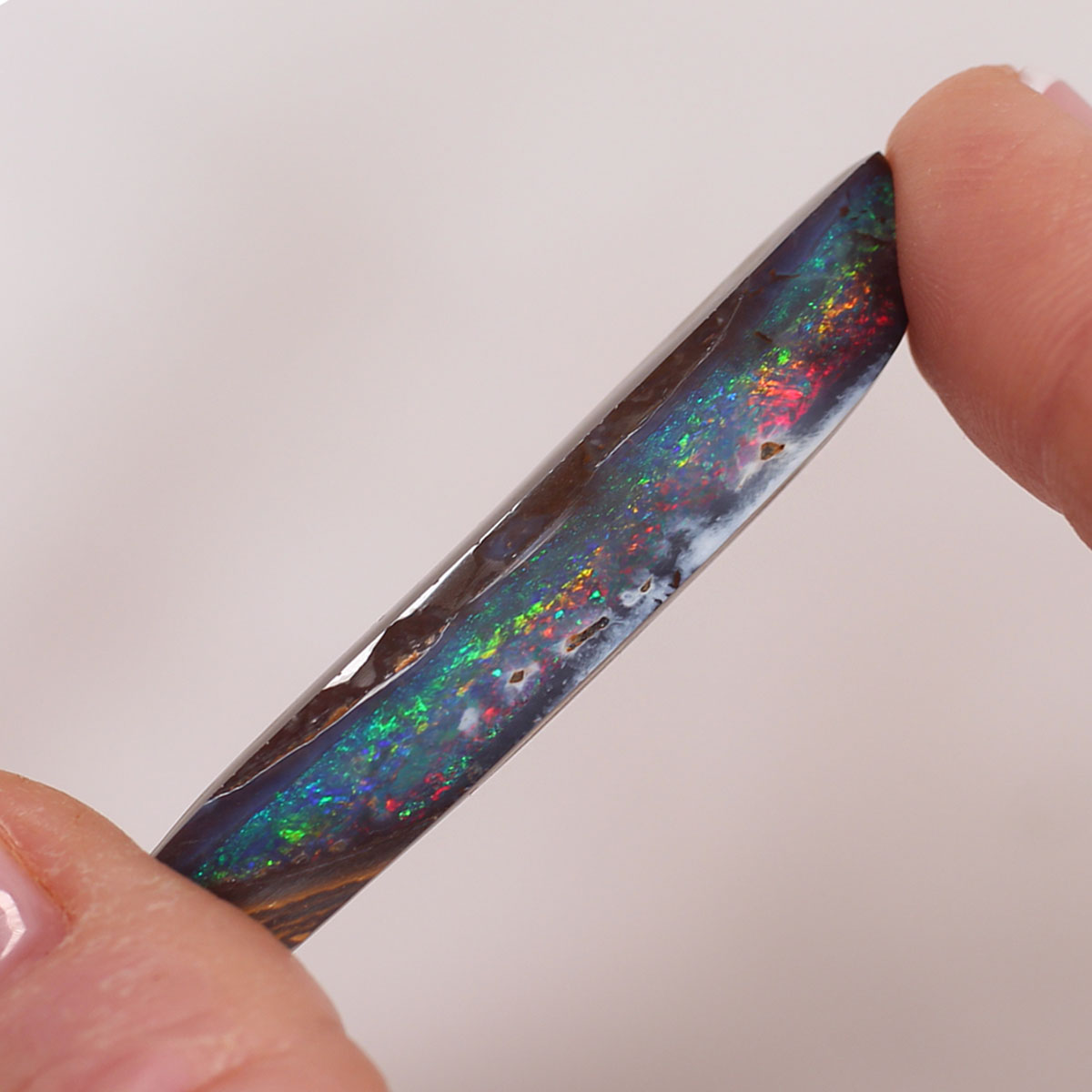 30.3 ct Boulder Opal - 9.5 x 42.4 x 6.3mm