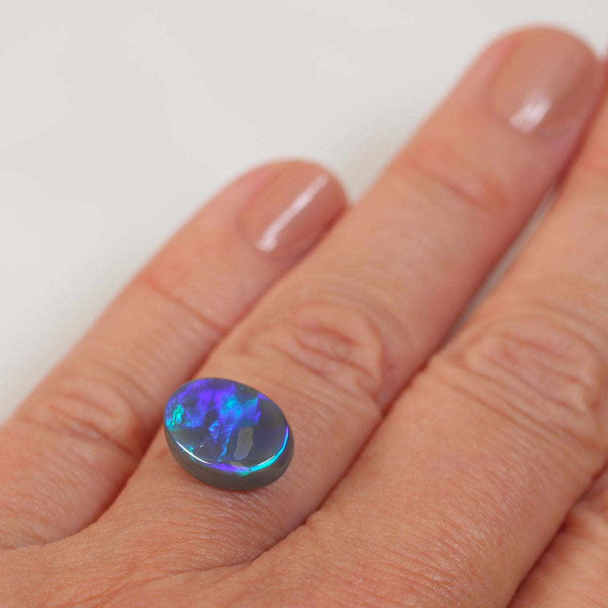 3.8ct Dark Opal - 9 x 11 x 4.7mm