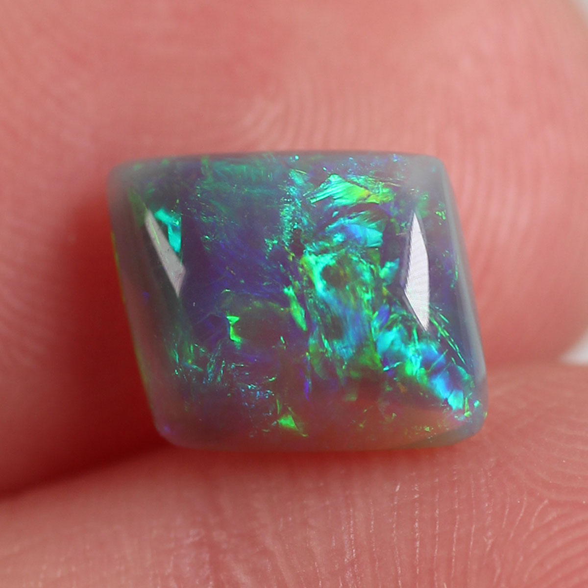 1.8ct Dark Opal - 6.6 x 8.7 x 4mm