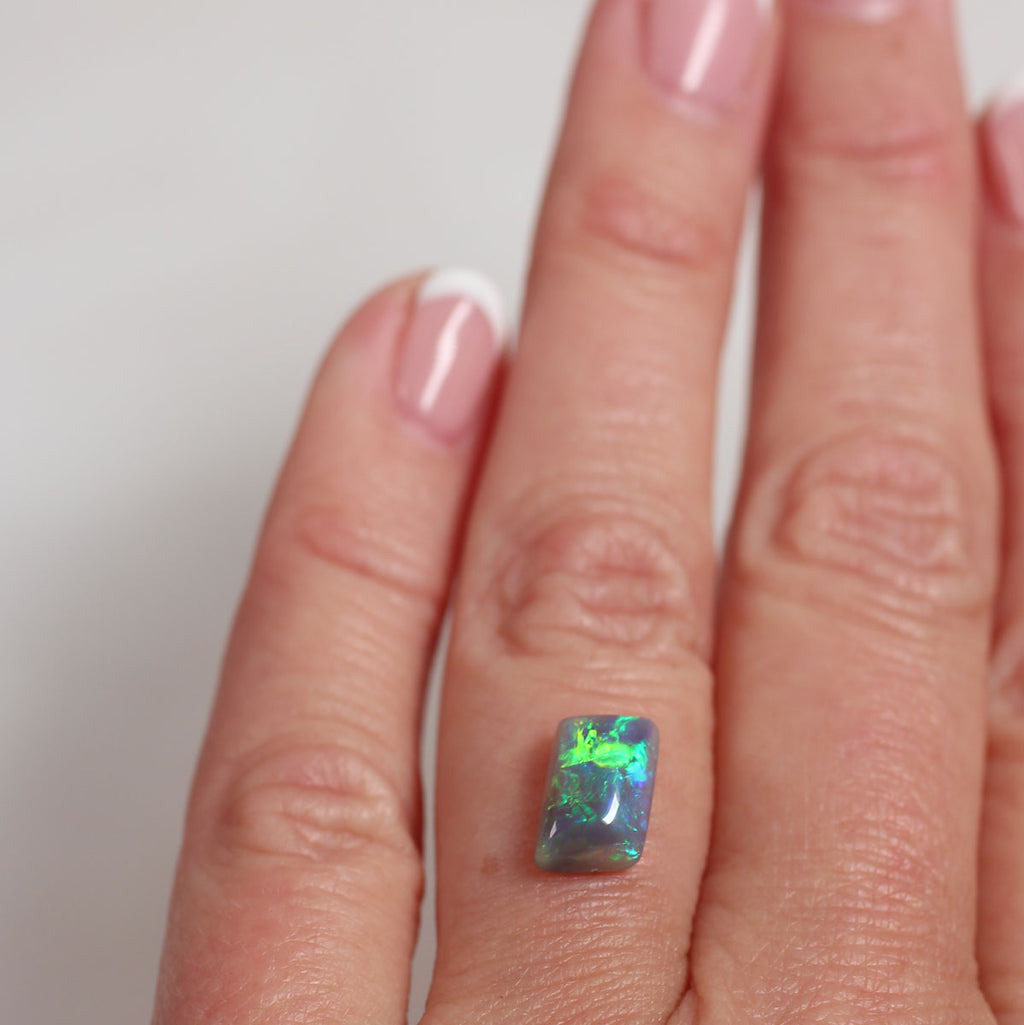 1.8ct Dark Opal - 6.6 x 8.7 x 4mm