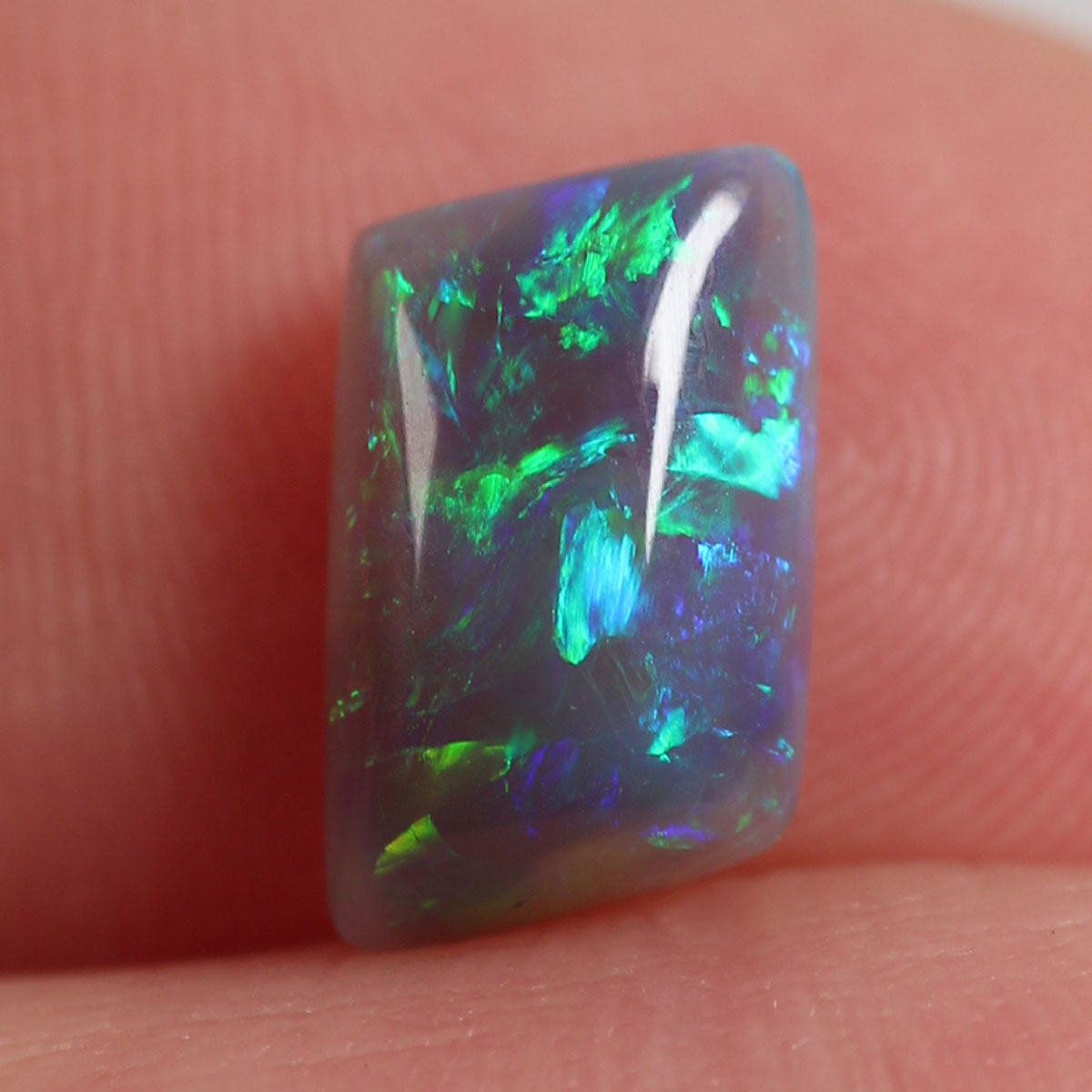 1.8 ct Dark Opal - 6.6 x 8.7 x 4mm