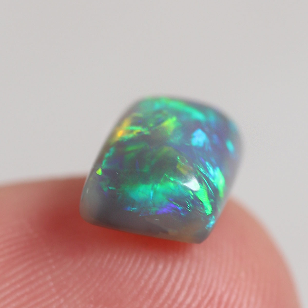 1.8ct Dark Opal - 6.6 x 8.7 x 4mm