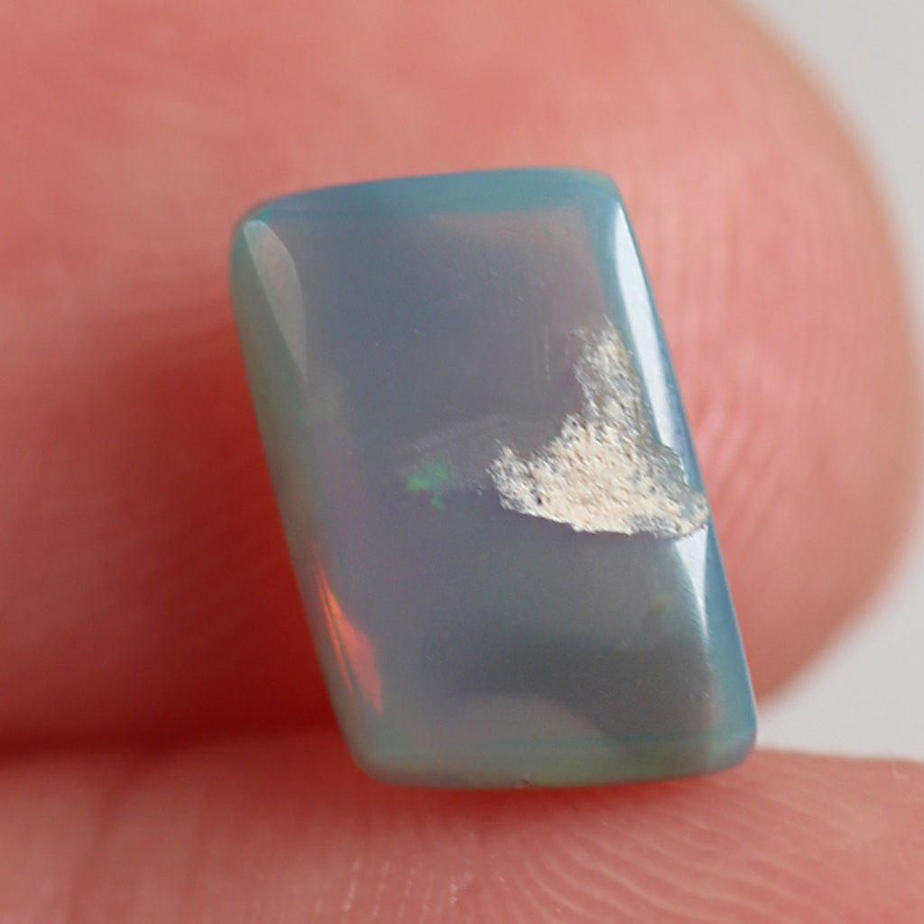 1.8ct Dark Opal - 6.6 x 8.7 x 4mm