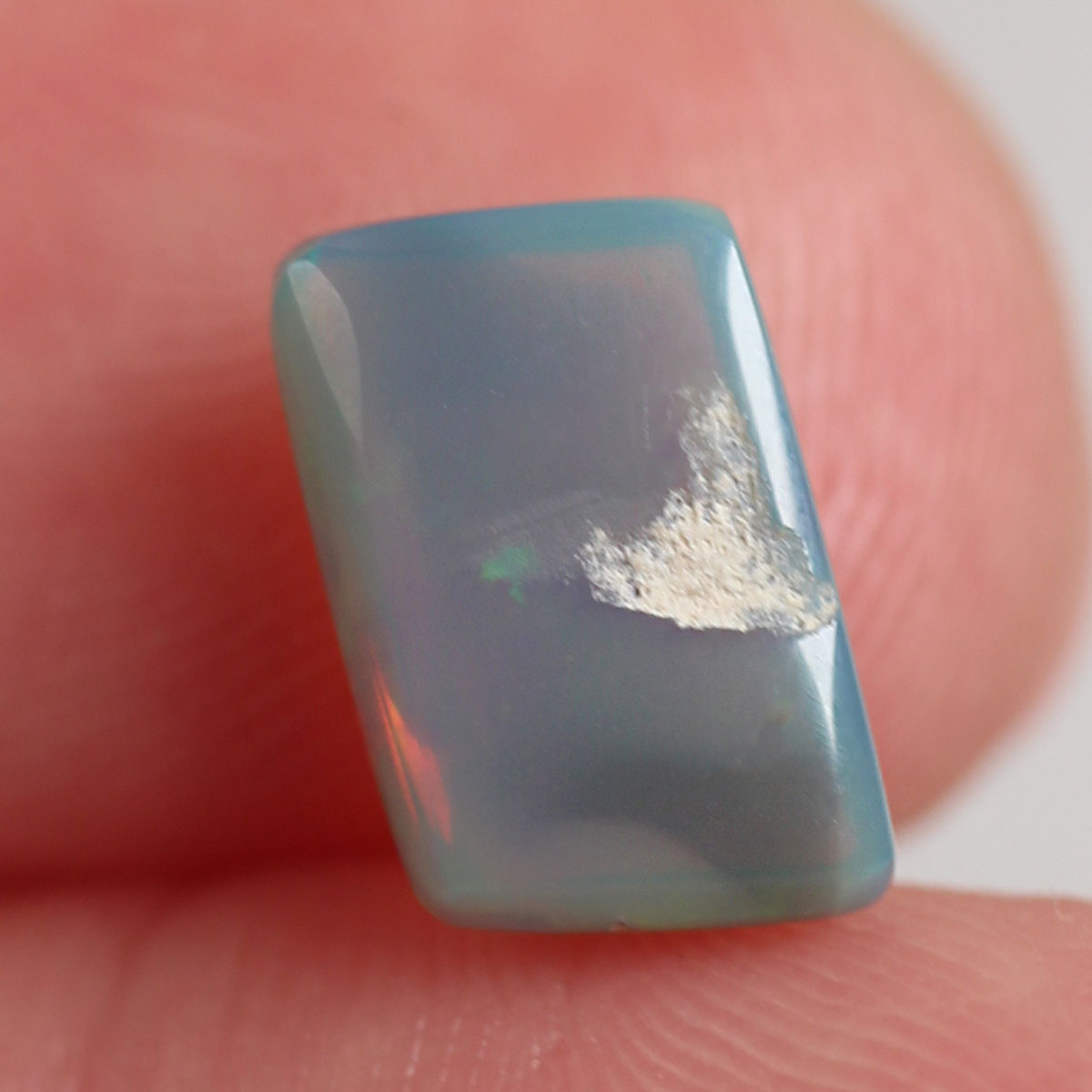 1.8ct Dark Opal - 6.6 x 8.7 x 4mm