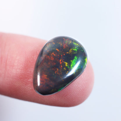 4.7ct Black Opal - 11.2 x 15.7 x 4mm