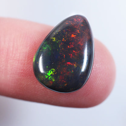 4.7ct Black Opal - 11.2 x 15.7 x 4mm