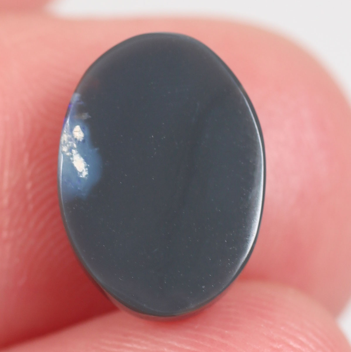 2.8 ct Black Opal - 9.6 x 11.2 x 3.5 mm