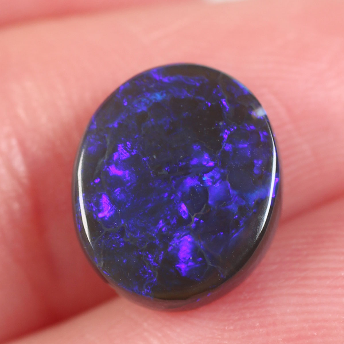 2.8 ct Black Opal - 9.6 x 11.2 x 3.5 mm