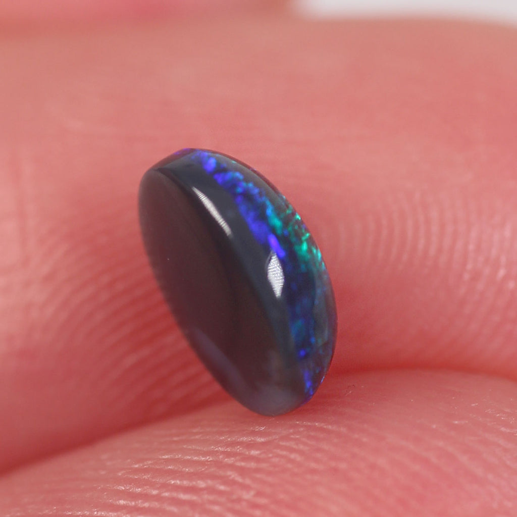 0.84ct Black Opal - 6 x 7.2 x 3mm