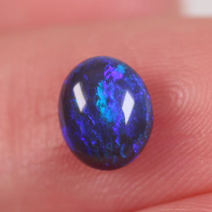 0.84 ct Black Opal - 6 x 7.2 x 3mm