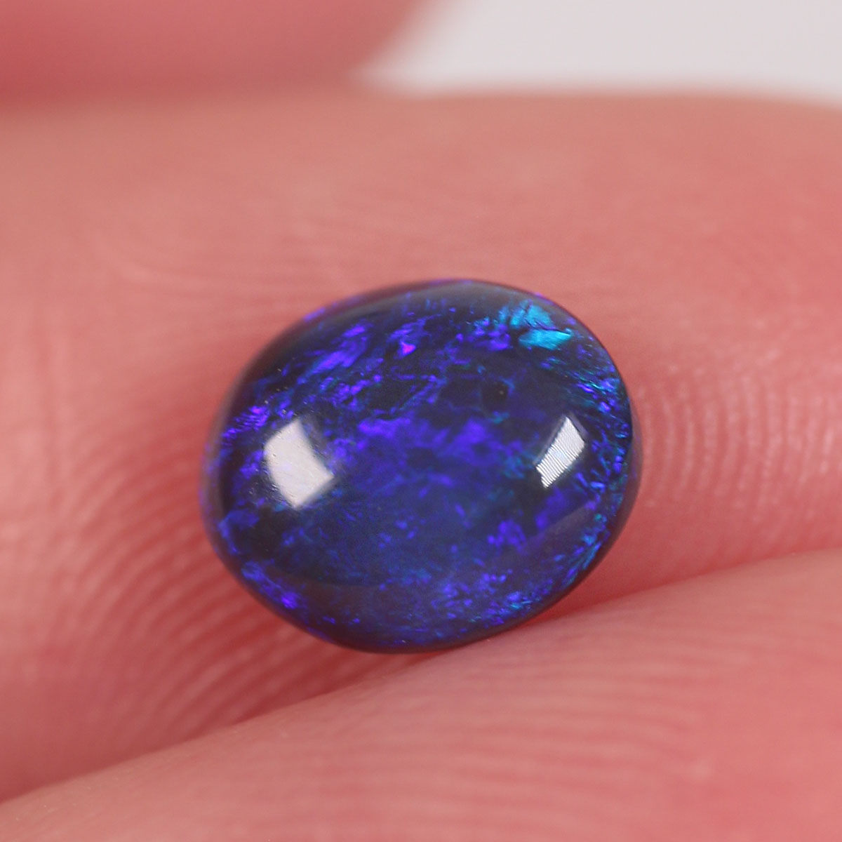 0.84ct Black Opal - 6 x 7.2 x 3mm