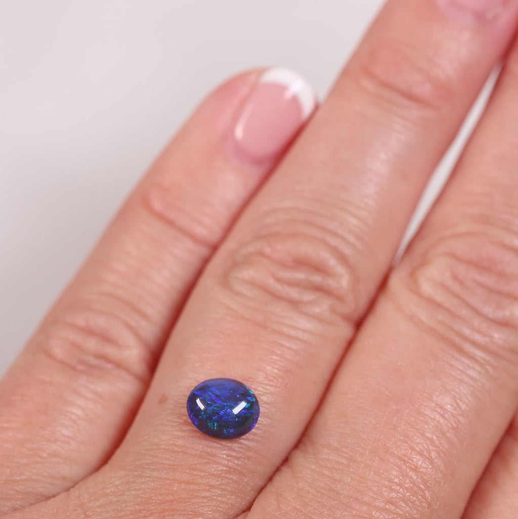 0.84ct Black Opal - 6 x 7.2 x 3mm