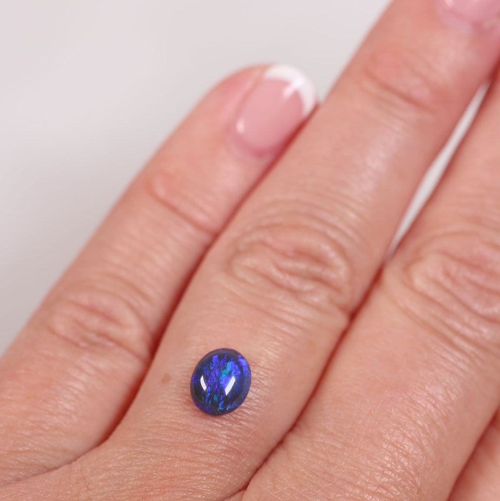 0.84ct Black Opal - 6 x 7.2 x 3mm