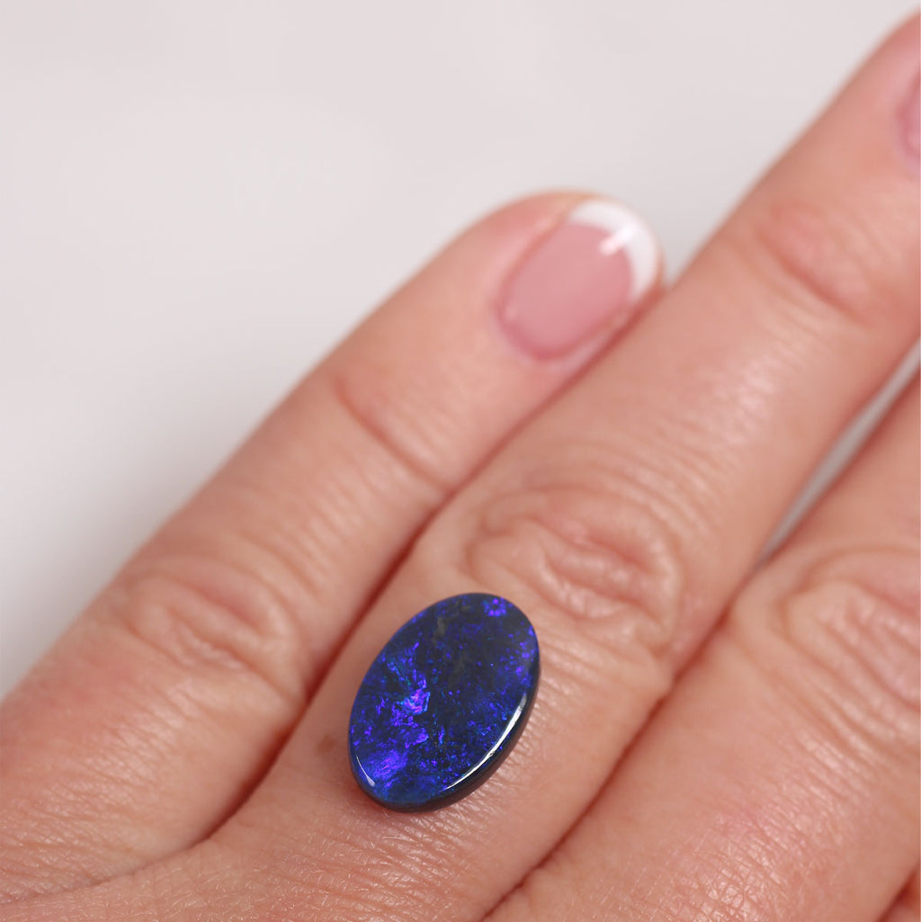 2.7ct Black Opal - 9.4 x 14 x 2.9mm