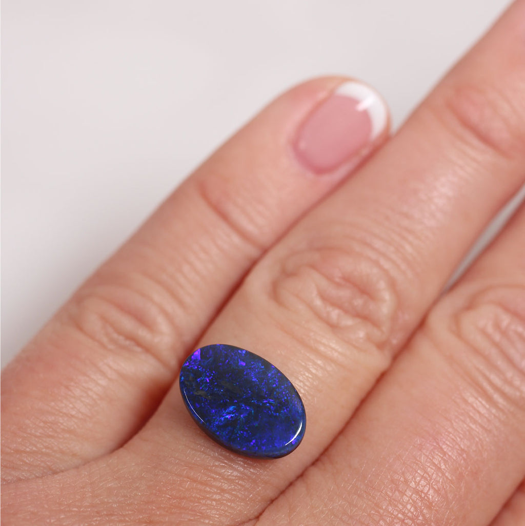 2.7ct Black Opal - 9.4 x 14 x 2.9mm