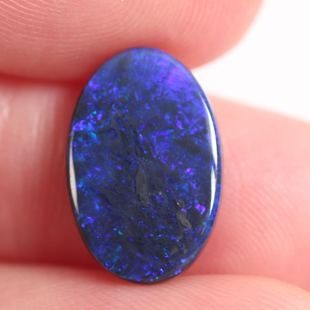 2.7ct Black Opal - 9.4 x 14 x 2.9mm